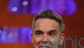 Robbie Williams says he would open for Oasis despite decades-long rivalry