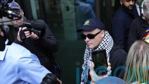 Kneecap rapper faces month-long wait over whether terror charge is thrown out