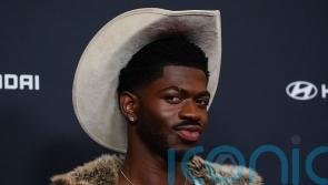 Lil Nas X held on suspicion of charging at LA police