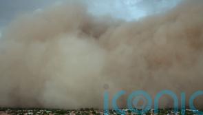 Dust storm darkens skies and blinds drivers in Arizona