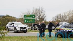 Manhunt under way after two police officers shot dead in rural Australia