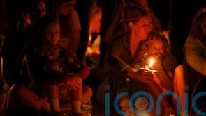 Two children dead and 17 people injured in shooting at Catholic school