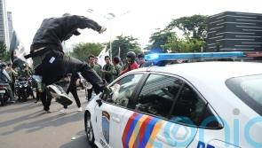 Tensions soar across Indonesia as protests against police erupt in cities