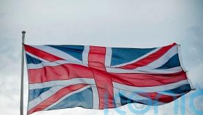 Police ‘removing flag’ were ‘putting up anti-vandal cameras’