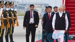 Chinese and Indian leaders meet in formal thaw in relations