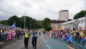 Protests outside asylum hotels ‘completely unacceptable’: Swinney