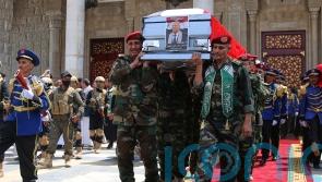 Yemenis mourn Houthi prime minister as rebel group targets ship in Red Sea