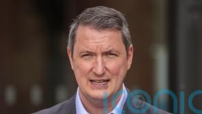 Families barricading themselves in homes after racist attacks, says Finucane