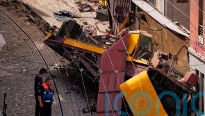 Investigators search for cause of Lisbon funicular crash that killed 16