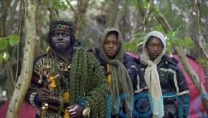 ‘African tribe’ evicted from woodland site and moves over fence