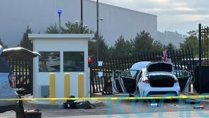 Suspect arrested after car rams into gate at FBI building