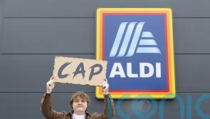 Lewis Cap-Aldi surprises shoppers with gig on supermarket roof
