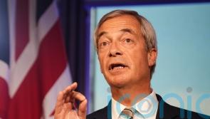 Farage says PM’s branding of Reform immigration policy as racist is a ‘disgrace’