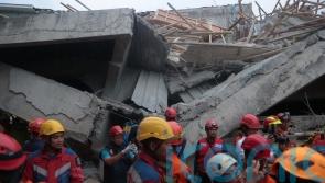 At least 91 students remain buried in rubble after Indonesia school collapse