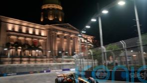 Lando Norris breaks front wing after pit collision during Singapore GP practice