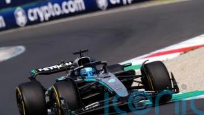 George Russell claims pole position at Singapore Grand Prix