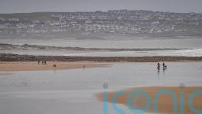 Footage shows rescue of surfer caught in powerful rip current