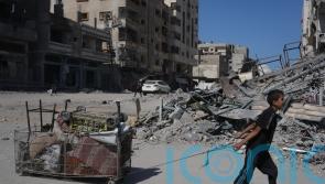 Palestinians return to ruins as Gaza ceasefire holds