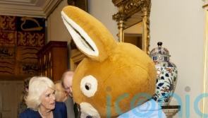 Queen meets Peter Rabbit as she wishes reading charity ‘happy 100th birthday’