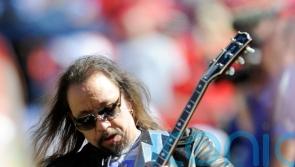 Kiss original lead guitarist and founding member Ace Frehley dies at 74