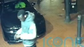 Asylum hotel murder trial shown video of suspect buying alcohol and dancing