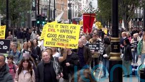 Thousands march through London in protest against digital ID plans