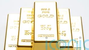 FTSE 100 reaches new high as gold and oil surge