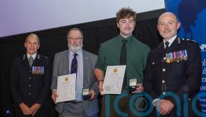 Father and son honoured for saving two children from burning building