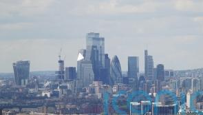 FTSE 100 hits record high after optimistic UK economic reports