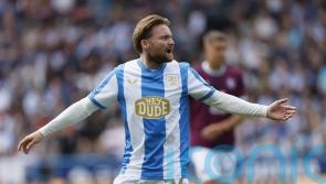 Wycombe make the most of Alfie May’s red card to see off Huddersfield