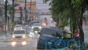 Melissa strengthens to a Category 5 hurricane as it nears Jamaica