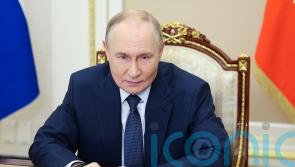 Russia’s nuclear-armed underwater drone tested successfully, Putin says