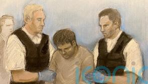 Afghan migrant appears in court charged with murder after triple stabbing