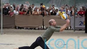 William enjoys game of volleyball as he begins five-day visit to Brazil