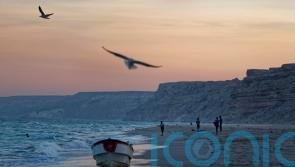 Attackers firing machine guns board tanker off Somalia coast