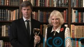 Queen welcomes Booker Prize-winning author at Clarence House