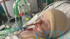 Baby diagnosed with brain tumour at three months enjoys first birthday at home