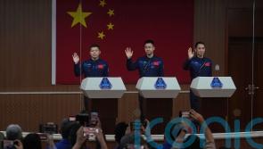 Chinese astronauts return from space station after delay blamed on space debris