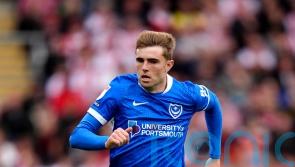 Zak Swanson sets Portsmouth on the road to victory over 10-man Millwall