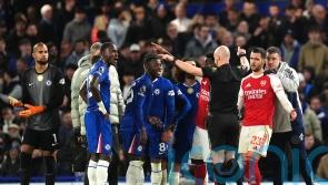 Ten-man Chelsea battle for a point against leaders Arsenal in fiery derby