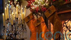 Sandringham curtains recycled into festive stockings for royal charity auction