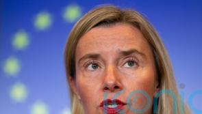 Former EU foreign policy head quits roles amid fraud investigation