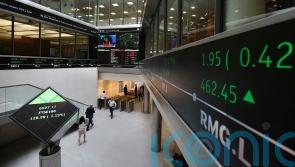 FTSE 100 up as Fed sounds softer tone than feared