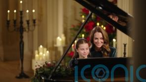 Kate and Charlotte perform together on the piano for royal carol concert