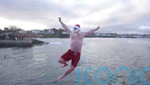 Crowds brave chilly temperatures for Christmas Day swim