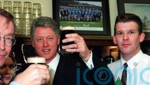 White House did not want photo of Clinton shaking Adams&rsquo; hand during 1995 visit