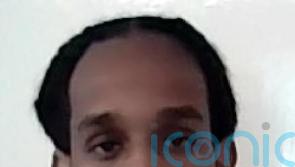 Prisoner on the run after fleeing on Christmas Day