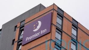 Stocks slip as Whitbread tops FTSE 100