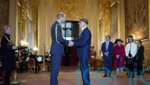 Oldham Athletic owner hands Prince of Wales note requesting party in the town