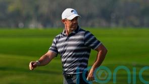 Rory McIlroy keeps himself in contention on penultimate day in Dubai